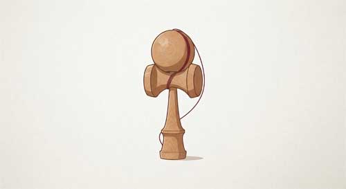 Kendama de madera con la bola capturada en el pico grande, mostrando la tensión de la cuerda
